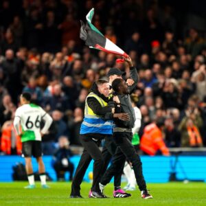 Fan storms England football match to raise Sudanese flag - Dabanga Radio TV Online